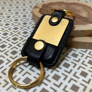 Pre-Owned ~ Never Used Vintage Tignanello Blk Leather and Gold Keychain